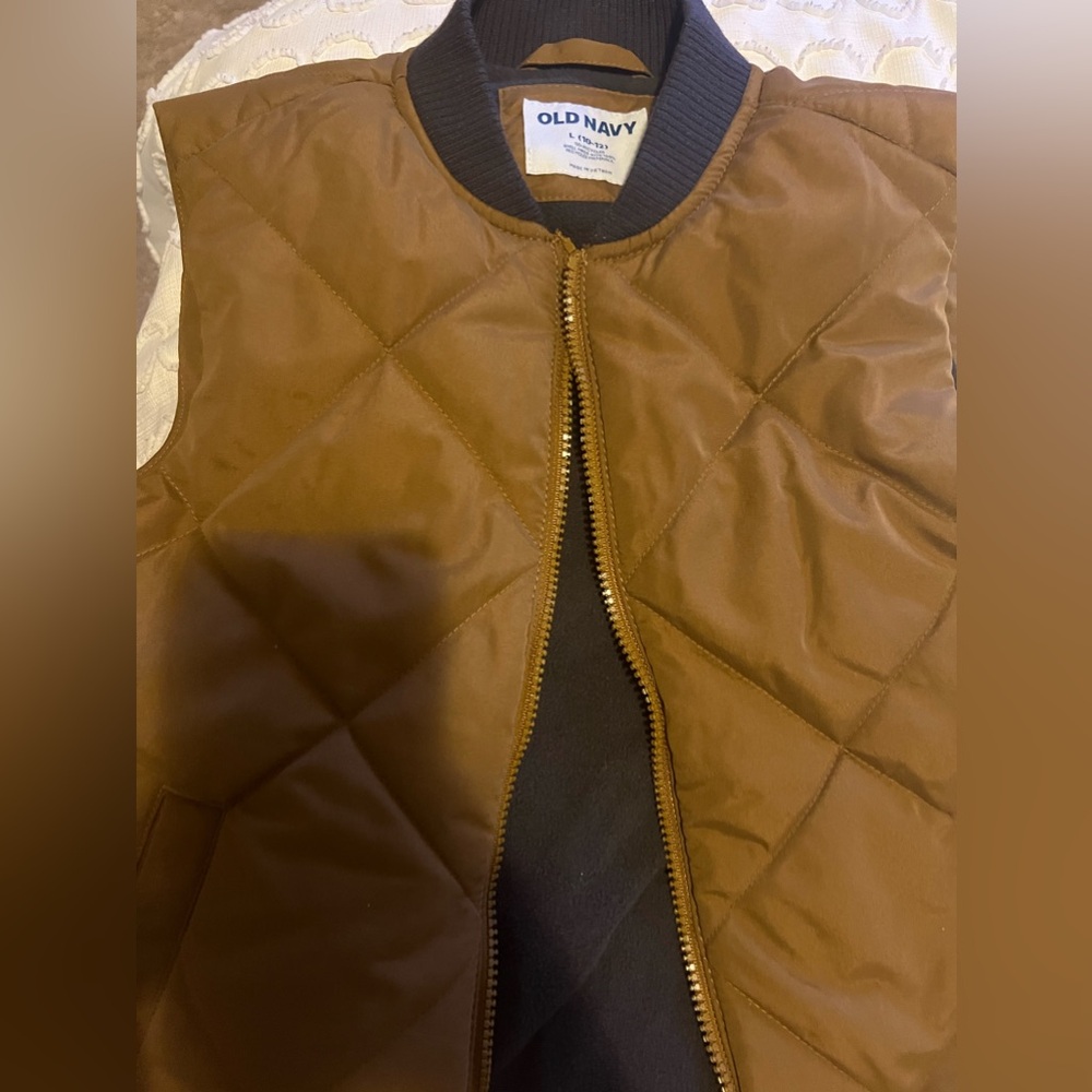 Tan zip vest size 10-12